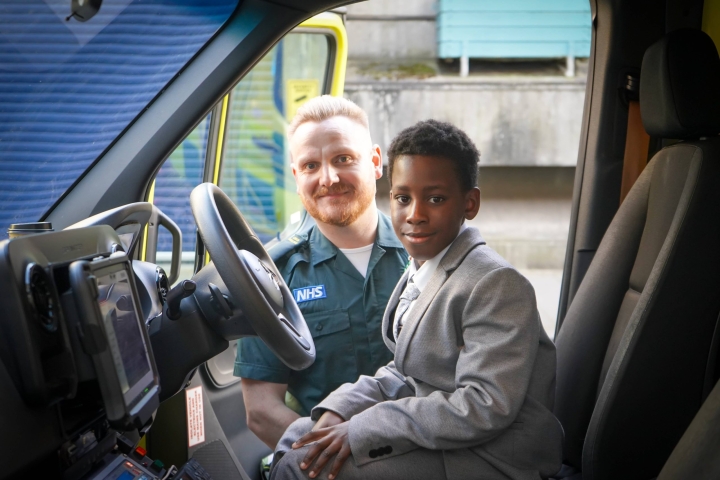 Isaiah-with-paramedic-Josh-1-1-scaled.jpg