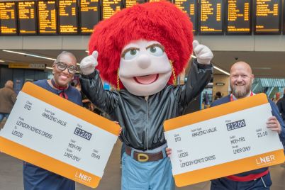 LNER-colleagues-in-Leeds-station-with-Eleanor-to-share-12-fare-news_cropped-scaled.jpg