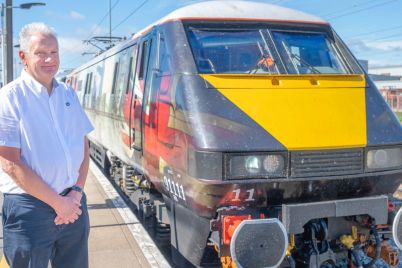 Nick-Dudley-alongside-a-LNER-Class-91-locomotive_cropped-scaled.jpg