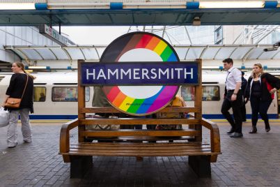 TfL-Image-LGBTQIA-Roundel-at-Hammersmith-station-scaled.jpg